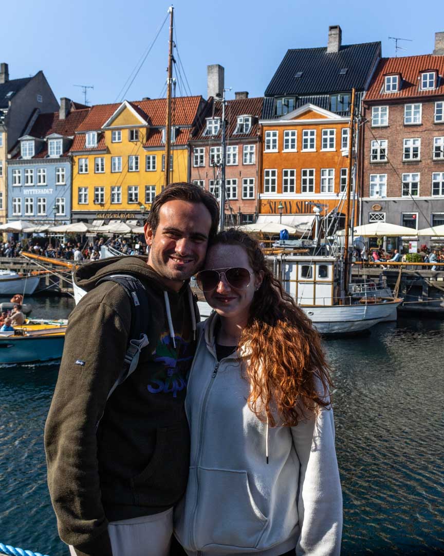 Couple at Nyhavn in Copenhagen, Denmark